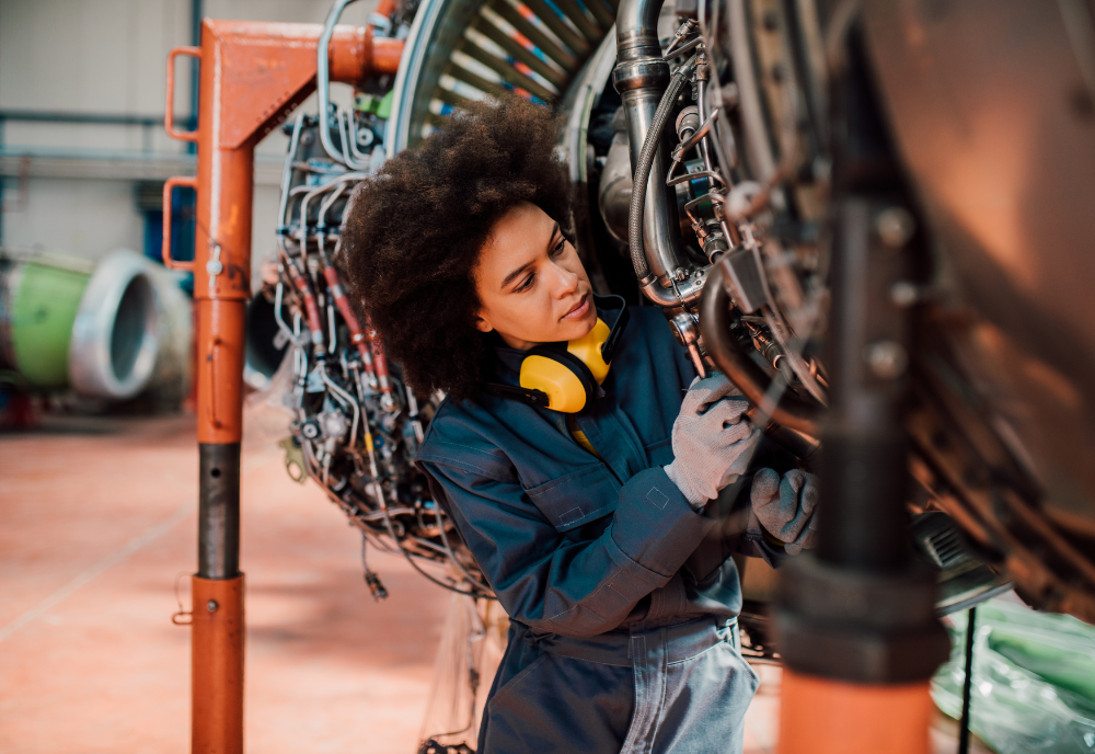 female defence mechanic completing a task